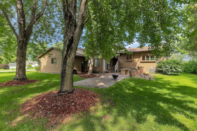 17473 Fairway Cir, Cold Spring, MN 56320 - back of property with a yard and a patio