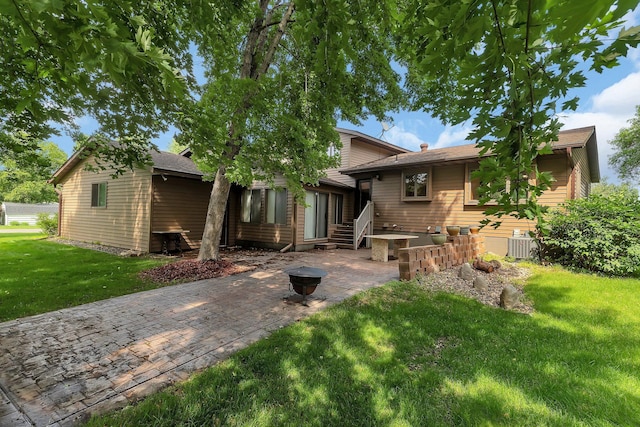 17473 Fairway Cir, Cold Spring, MN 56320 - back of house featuring a yard, a patio, and entry steps