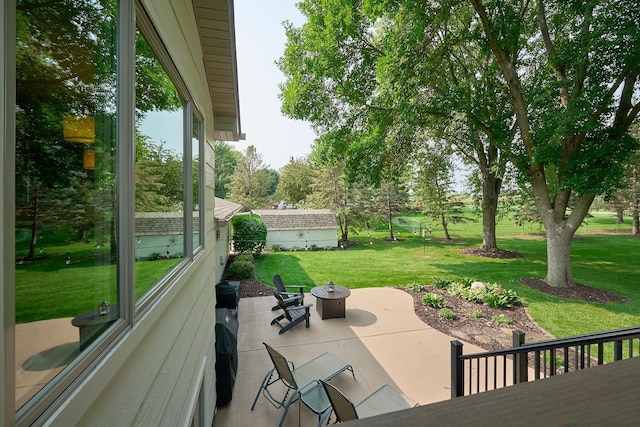 view of patio / terrace with a fire pit