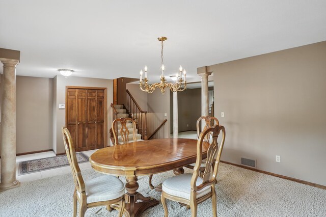 8681 144th Street Ct, Apple Valley, MN 55124 - dining area with ornate columns, light colored carpet, stairs, and a chandelier
