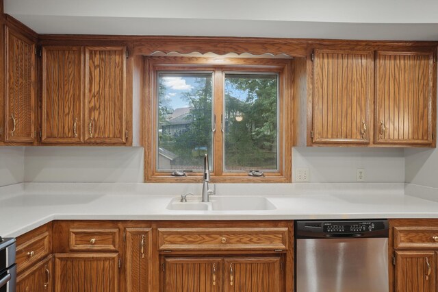 8681 144th Street Ct, Apple Valley, MN 55124 - kitchen featuring dishwasher, a sink, light countertops, and brown cabinets