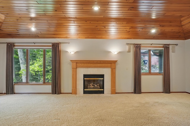 8681 144th Street Ct, Apple Valley, MN 55124 - unfurnished living room with wood ceiling, carpet, a tiled fireplace, baseboards, and recessed lighting