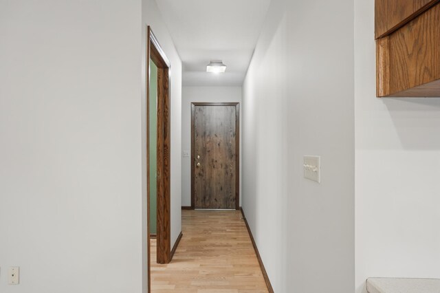 8681 144th Street Ct, Apple Valley, MN 55124 - corridor featuring light wood finished floors