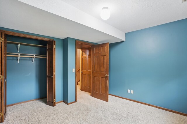 8681 144th Street Ct, Apple Valley, MN 55124 - unfurnished bedroom featuring baseboards, carpet, and a closet