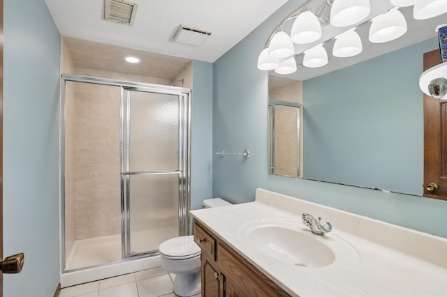 8681 144th Street Ct, Apple Valley, MN 55124 - full bath with a stall shower, toilet, tile patterned floors, vanity, and recessed lighting