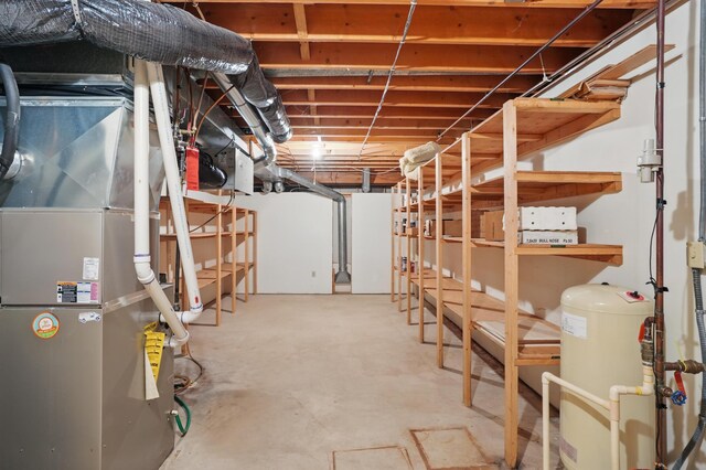 8681 144th Street Ct, Apple Valley, MN 55124 - unfinished below grade area with heating unit and a water pressure tank