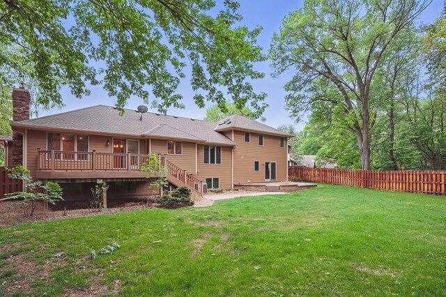 8681 144th Street Ct, Apple Valley, MN 55124 - back of property with a chimney, stairs, a deck, a sunroom, and a patio