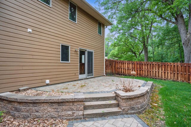 8681 144th Street Ct, Apple Valley, MN 55124 - rear view of property featuring a patio area and fence
