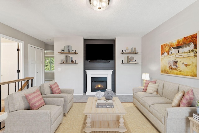 8754 Cottonwood Ln N, Maple Grove, MN 55369 - living area featuring light carpet, a fireplace, baseboards, and a textured ceiling