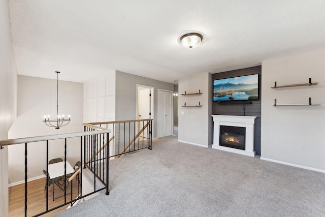 8754 Cottonwood Ln N, Maple Grove, MN 55369 - hall with an upstairs landing, a chandelier, baseboards, and carpet