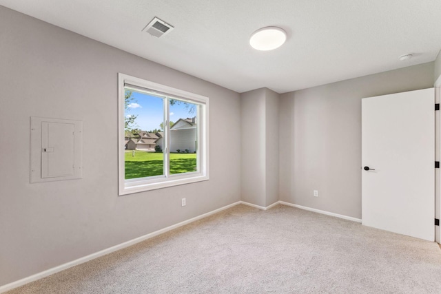 8754 Cottonwood Ln N, Maple Grove, MN 55369 - empty room with electric panel, carpet floors, and baseboards