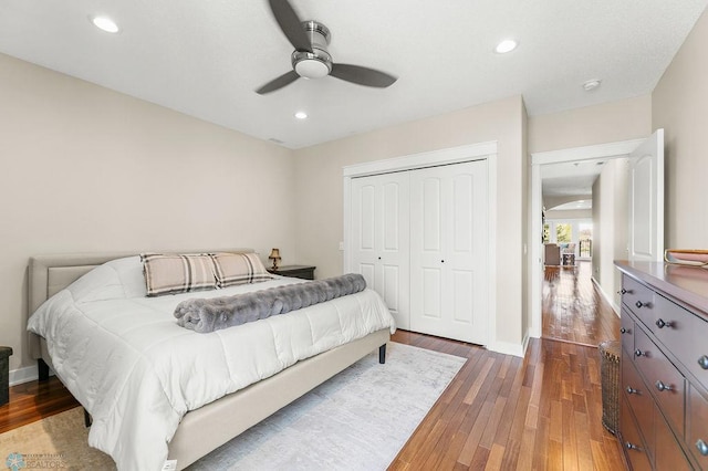2501 30th Ave S Unit 201, Fargo, ND 58103 - bedroom with a closet, wood finished floors, recessed lighting, a ceiling fan, and baseboards