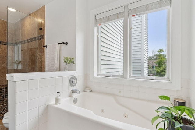4084 Wild Goose Ln, White Bear Twp, MN 55110 - full bathroom featuring a tub with jets, tiled shower, toilet, and tile walls