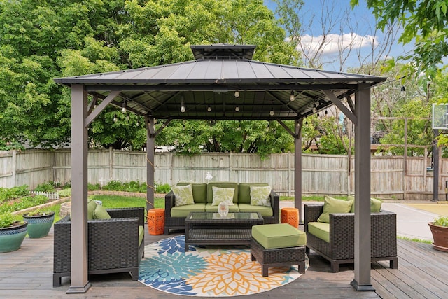4084 Wild Goose Ln, White Bear Twp, MN 55110 - deck featuring a gazebo, outdoor lounge area, and a fenced backyard