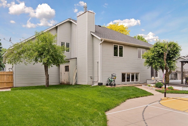 4084 Wild Goose Ln, White Bear Twp, MN 55110 - rear view of property featuring a chimney and roof with shingles