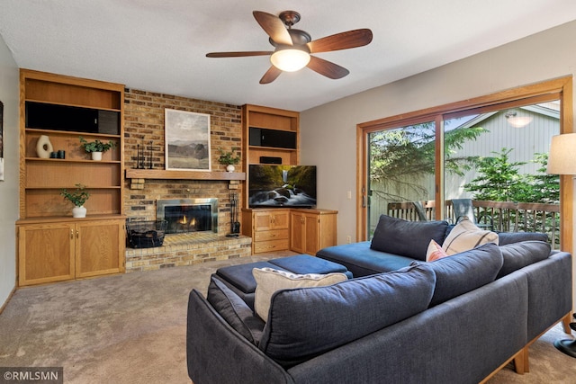 12762 Foliage Ave, Apple Valley, MN 55124 - carpeted living room with ceiling fan, a brick fireplace, and built in features