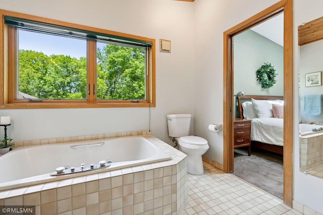 12762 Foliage Ave, Apple Valley, MN 55124 - full bath featuring toilet, a garden tub, ensuite bathroom, and tile patterned flooring