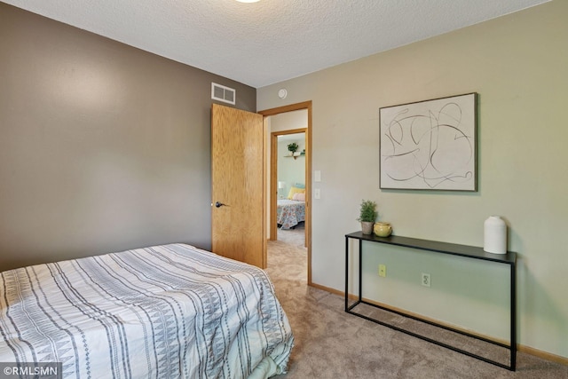 12762 Foliage Ave, Apple Valley, MN 55124 - bedroom featuring carpet, a textured ceiling, and baseboards