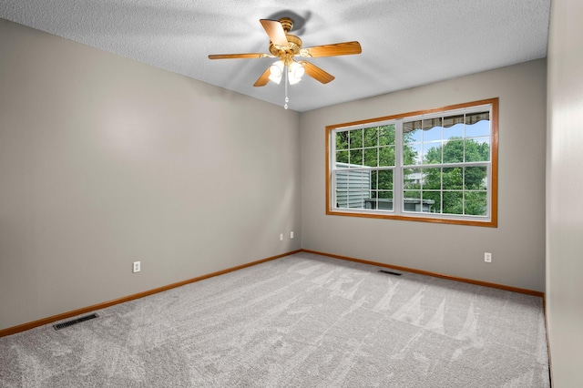 351 100th Ct NE, Blaine, MN 55434 - unfurnished room with carpet flooring, a ceiling fan, and a textured ceiling