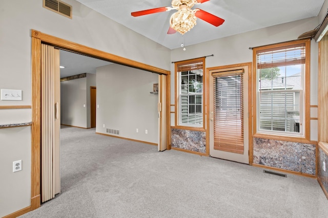 351 100th Ct NE, Blaine, MN 55434 - unfurnished room with a ceiling fan and carpet flooring