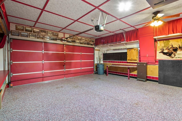 351 100th Ct NE, Blaine, MN 55434 - garage with a garage door opener and a ceiling fan