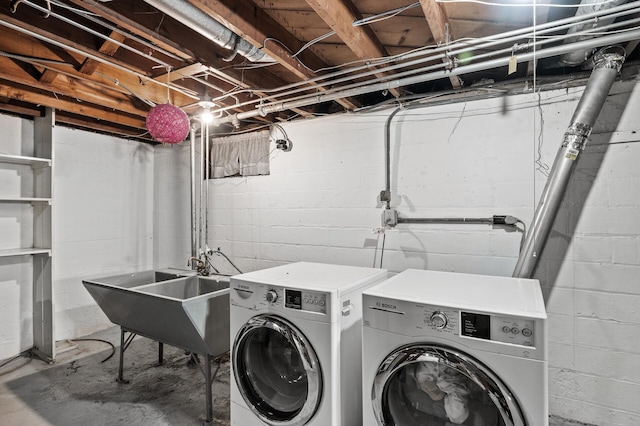 laundry area with washer and clothes dryer