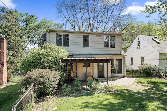 back of house featuring a patio area