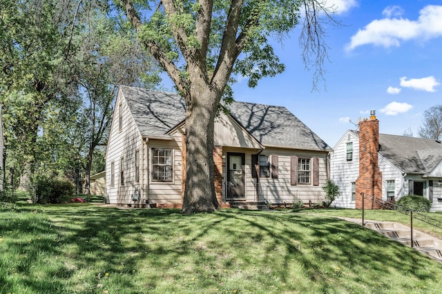 view of front of home with a front yard