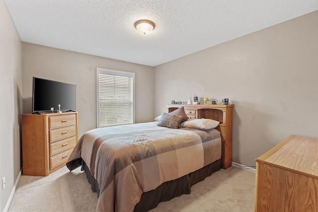 2119 Cedar Grove Trl, Eagan, MN 55122 - bedroom with light colored carpet, a textured ceiling, and baseboards