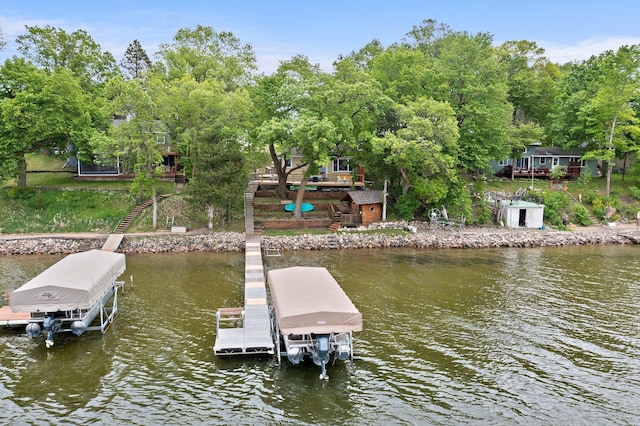 17860 45th St NW, South Haven, MN 55382 - dock area featuring boat lift and a water view