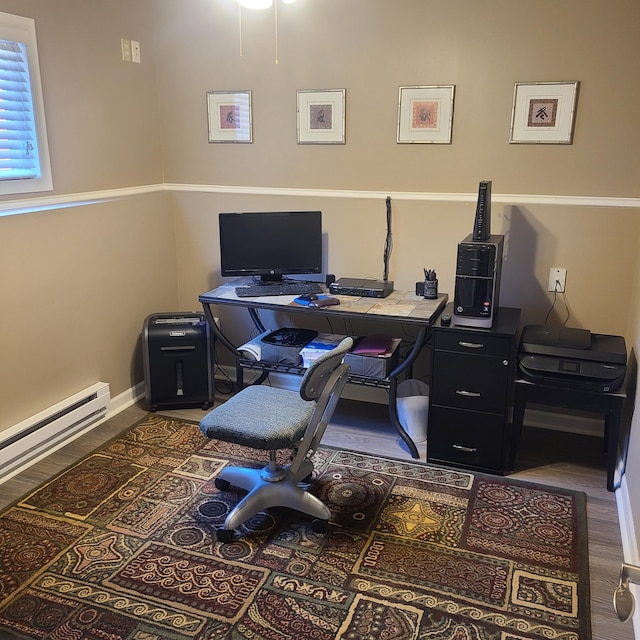 14473 Barnes Dr, Lake View Twp, MN 56501 - office space featuring wood finished floors, baseboard heating, and baseboards