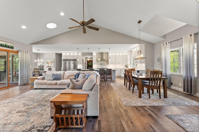 W10415 521st Ave, Prescott, WI 54021 - living area with a chandelier, ceiling fan, wood finished floors, high vaulted ceiling, and recessed lighting