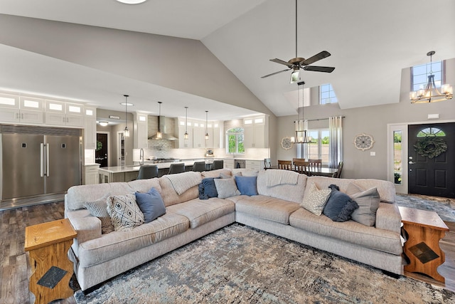 W10415 521st Ave, Prescott, WI 54021 - living area featuring a chandelier, high vaulted ceiling, dark wood-type flooring, and a ceiling fan