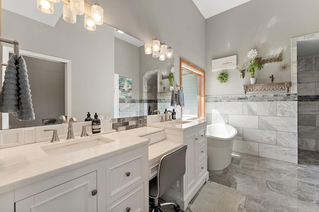 W10415 521st Ave, Prescott, WI 54021 - bathroom with a chandelier, tile walls, a walk in shower, a soaking tub, and marble tiled floors