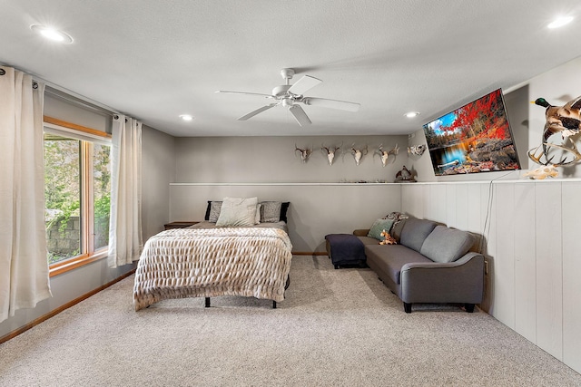 W10415 521st Ave, Prescott, WI 54021 - bedroom with carpet floors, recessed lighting, baseboards, ceiling fan, and a textured ceiling