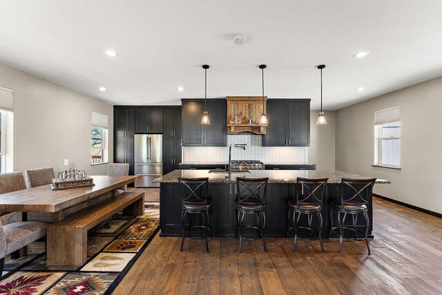 W10415 521st Ave, Prescott, WI 54021 - kitchen with stainless steel refrigerator, dark wood-style flooring, healthy amount of natural light, and recessed lighting