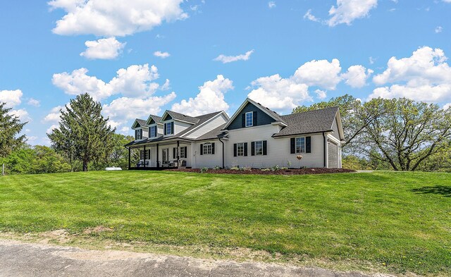 W10415 521st Ave, Prescott, WI 54021 - view of front of house with a front yard and a porch