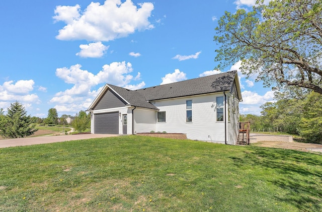 W10415 521st Ave, Prescott, WI 54021 - view of front of home featuring a garage, concrete driveway, a front yard, and a shingled roof