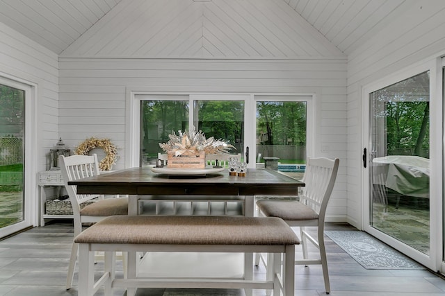 sunroom / solarium with lofted ceiling