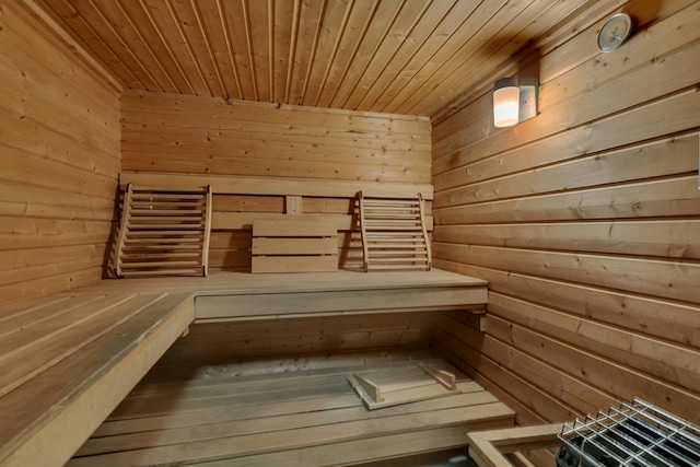 relaxing sauna with wooden ceiling and wood walls