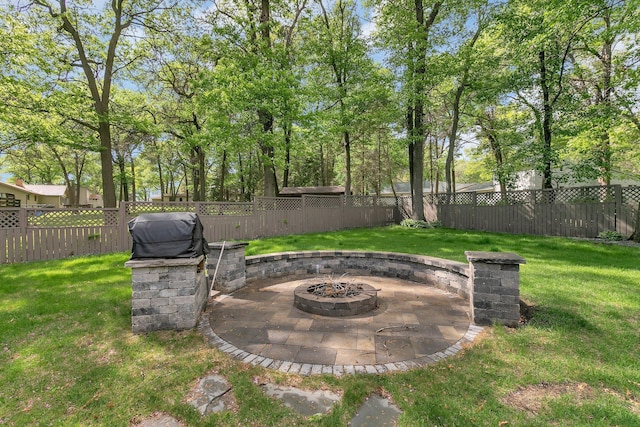 view of yard with an outdoor fire pit and a patio