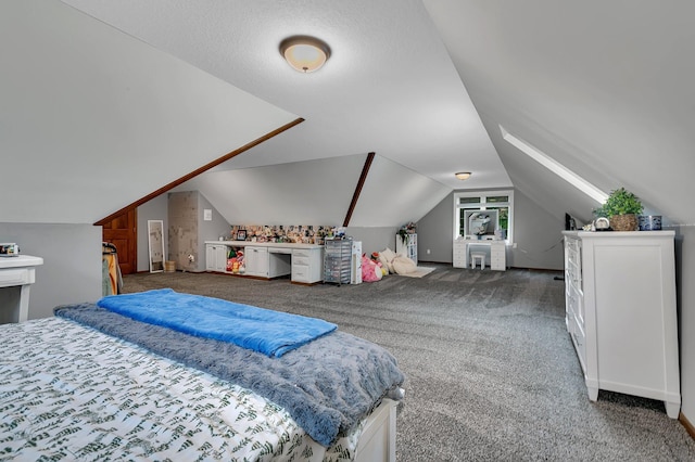 carpeted bedroom featuring lofted ceiling