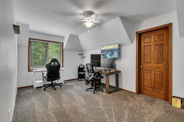 office with a ceiling fan, carpet floors, a textured ceiling, and baseboards