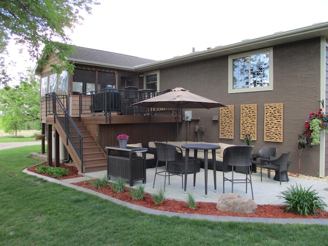 8300 263rd St, Saint Cloud, MN 56301 - back of property with a patio area, a yard, stairway, and a deck
