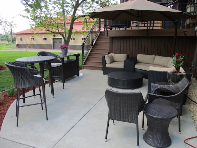8300 263rd St, Saint Cloud, MN 56301 - view of patio / terrace with stairs, an outdoor hangout area, and outdoor dining space
