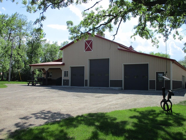 8300 263rd St, Saint Cloud, MN 56301 - view of outbuilding with an outdoor structure and driveway