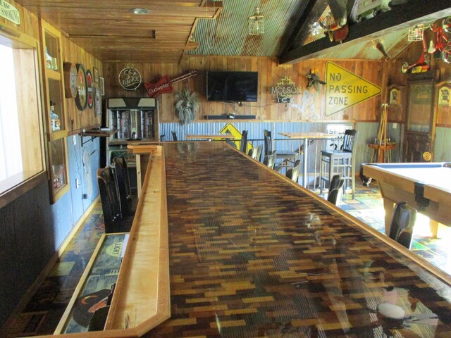 8300 263rd St, Saint Cloud, MN 56301 - playroom with wood walls, billiards table, vaulted ceiling, and wooden ceiling