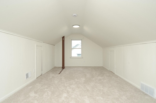 1459 Maywood St, Saint Paul, MN 55117 - additional living space with light colored carpet and lofted ceiling
