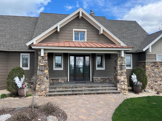 23380 127th St, Glenwood, MN 56334 - property entrance with covered porch, a standing seam roof, and a shingled roof