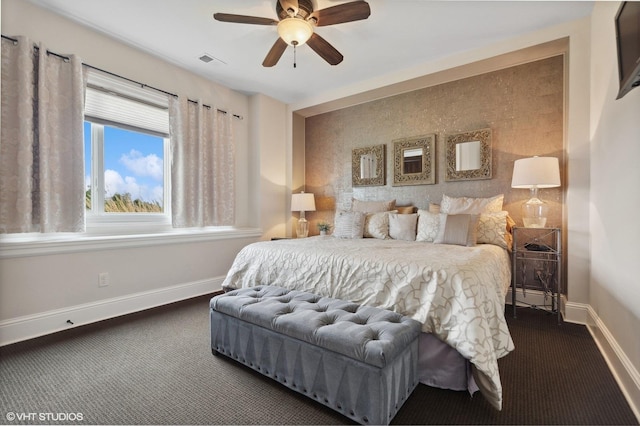 23380 127th St, Glenwood, MN 56334 - bedroom featuring dark colored carpet, baseboards, and a ceiling fan